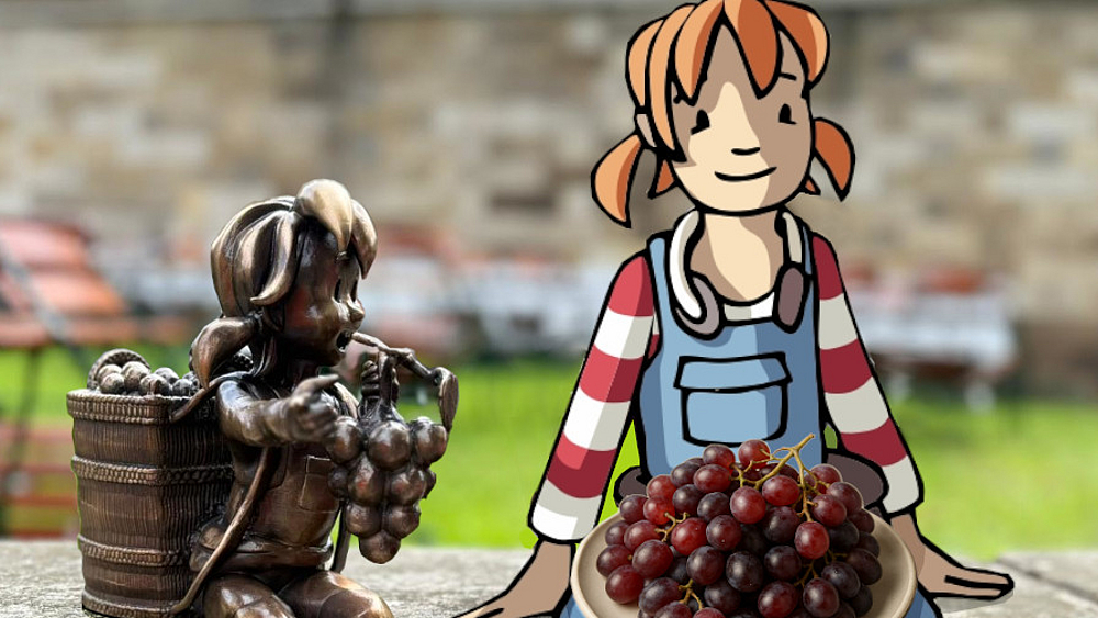 Pin sitzt beben ihrer Wein-Bronzefigur